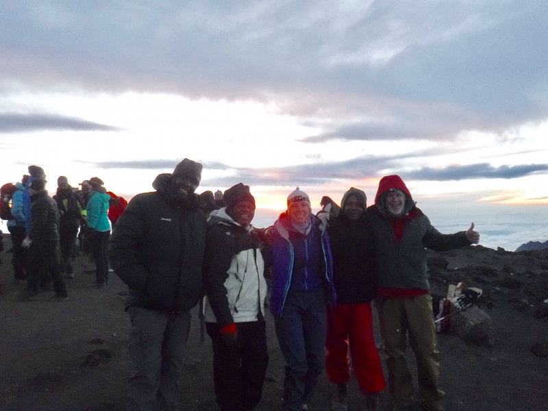 Our happy group at sunrise at 5895m